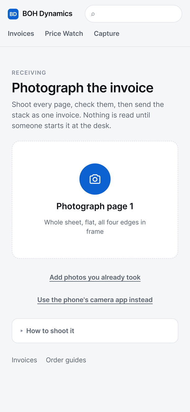 The capture screen on a phone: photograph the invoice, page one, with fallbacks for photos already taken.